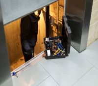 Elevator maintenance being performed